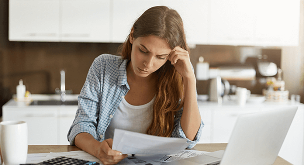 woman-reading-gas-bill