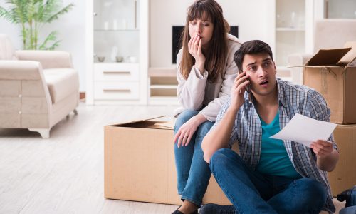 Young couple receive letter from mortgage lender asking them to repay their home loans.
